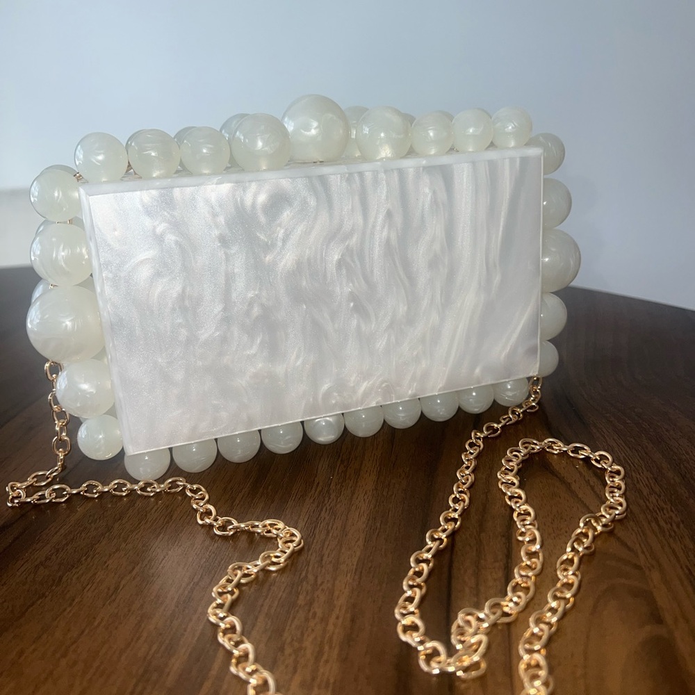 Elegant Pearl White Clutch with Gold Chain